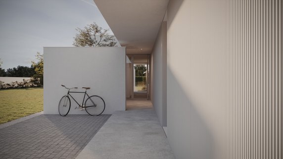 Biała, minimalistyczna bryła z efektownym patio