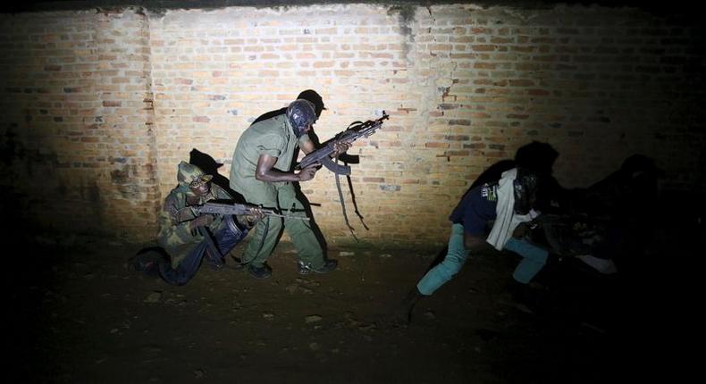 Armed vigilantes patrol in the center of Bujumbura, Burundi, November 20, 2015. REUTERS/Goran Tomasevic