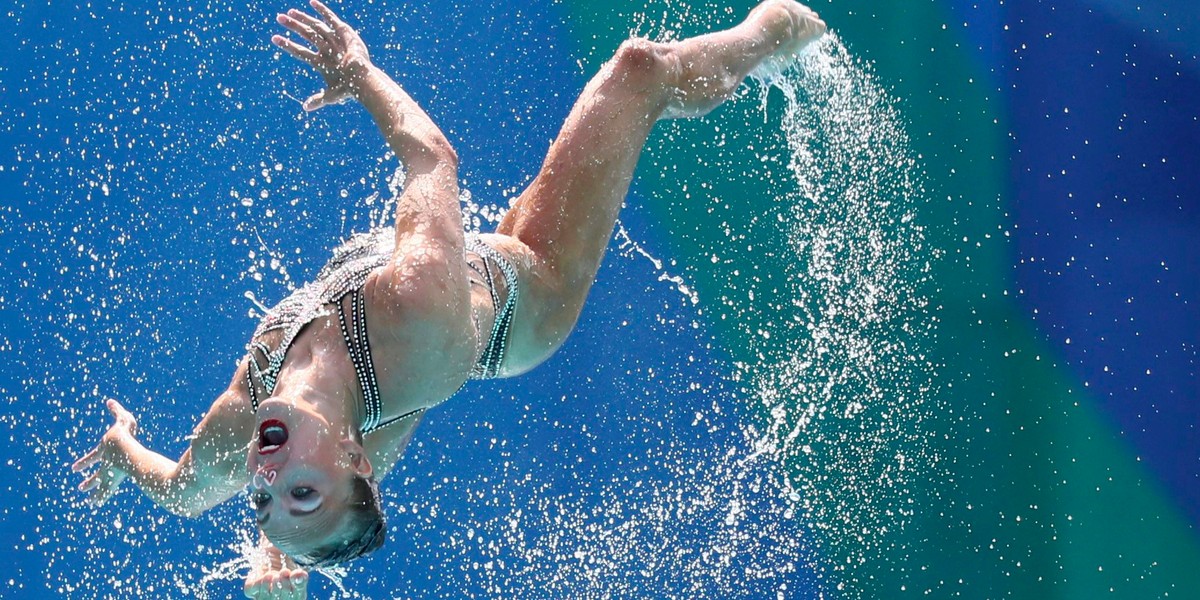 Team Russia competing in the synchronised swimming technical routine finals.