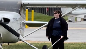 Kaiya Armstrong walking away from plane after landing in Washington DC.The Foundation for Blind Children