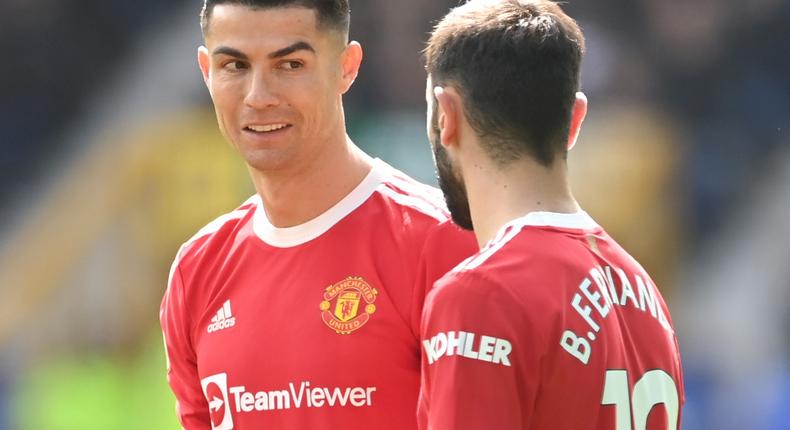 Cristiano Ronaldo and Bruno Fernandes in a Manchester United jersey.  