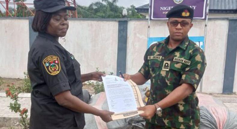 Navy hands over 15 bags of seized cannabis to NDLEA in Badagry