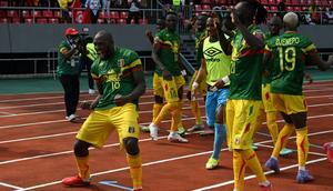 Ibrahima Kone (L) celebrates after scoring the decisive penalty for Mali against Tunisia in Limbe Creator: Issouf SANOGO