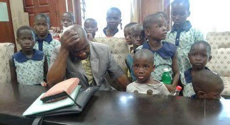 Pastor Onoyngu Chibuike appears sober in a picture of him and the children.