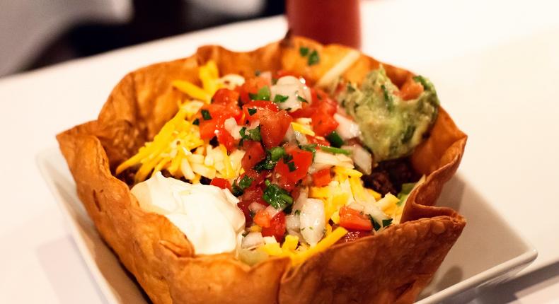 The taco bowl is a mess of vaguely passable Mexican-esque components, slightly elevated by a fresh and crunchy bowl. It was … fine. For $8, we'd buy it again, but there's no reason someone should pay $18 for this faux Tex-Mex jumble.