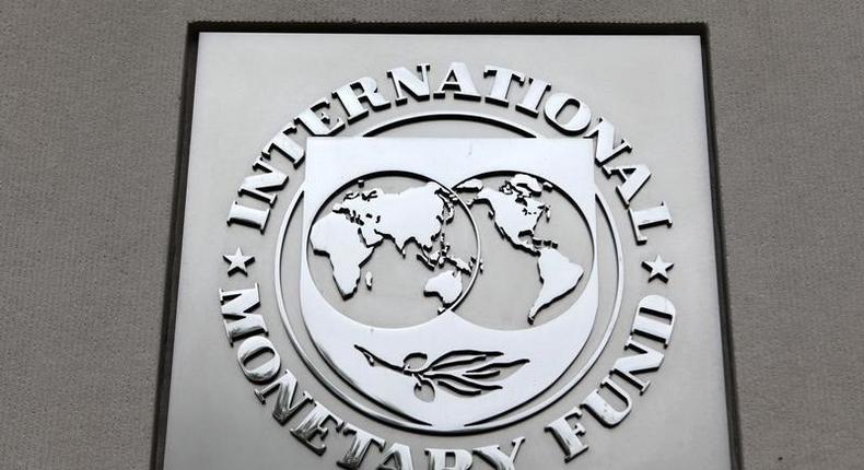 The International Monetary Fund (IMF) logo is seen at the IMF headquarters building during the 2013 Spring Meeting of the International Monetary Fund and World Bank in Washington, April 18, 2013. 