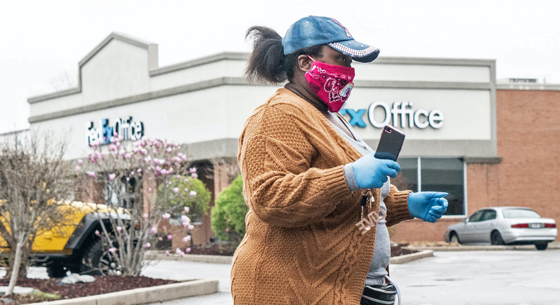 African American shopper wearing mask against coronavirus, St Louis. April 2020