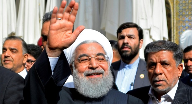 Iranian President Hassan Rouhani visits the Shiite holy city of Najaf during a March 2019 trip to Iraq