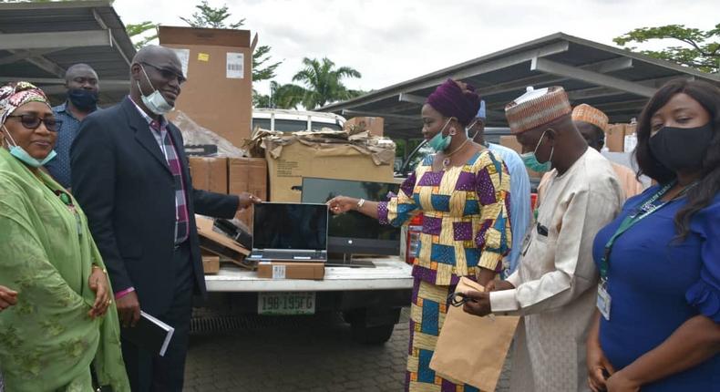 Mrs Abike Dabiri-Erewa, CEO/Chairman of Nigerians In Diaspora Commission (NIDCOM) receives Office equipments to donated to her commission by the Nigerian Ports Authority. [Twitter/@nidcom_gov]