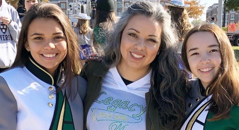 Vanessa Corral and her two daughters in their marching band uniforms in Frisco, Texas.