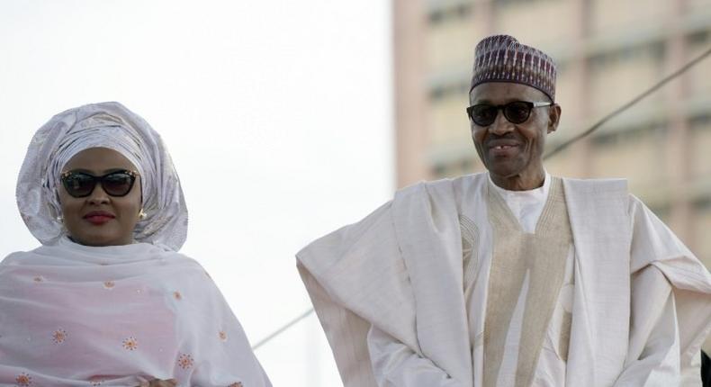 Nigerian President Mohammadu Buhari arrives with his wife Aisha, before taking oath of office in Abuja, on May 29, 2015