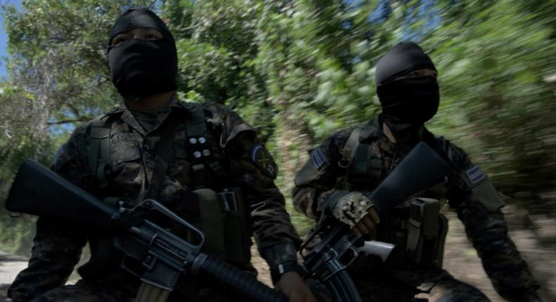 Soldiers patrol in search of gang members around the municipalities of San Martin and San Jose Guayabal, in El Salvador