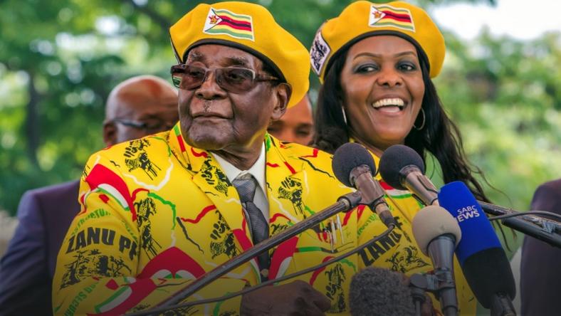 Robert Mugabe and his wife Grace, pictured at a rally on November 8 2017 -- one of their last appearances before his fall from power