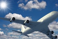 Airplane flying over a blue sky