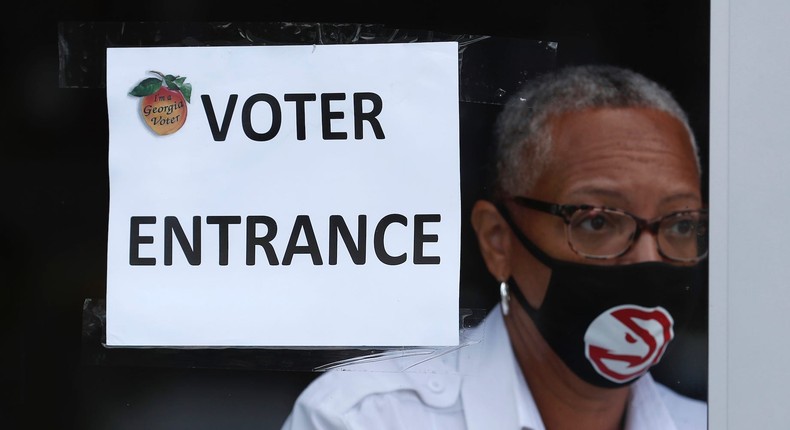 A security guard at the State Farm Arena, home of the NBA's Atlanta Hawks, on July 17.