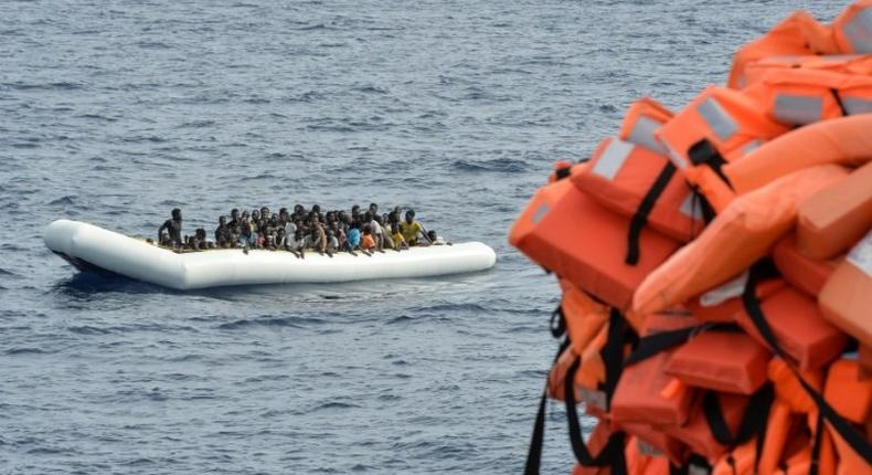 Migrants wait to be rescued off the coast of Libya on November 5, 2016