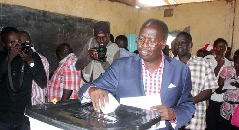 Baringo Governor Benjamin Cheboi casts his vote at Shimoni in Eldama Ravine during Jubilee Party primaries.