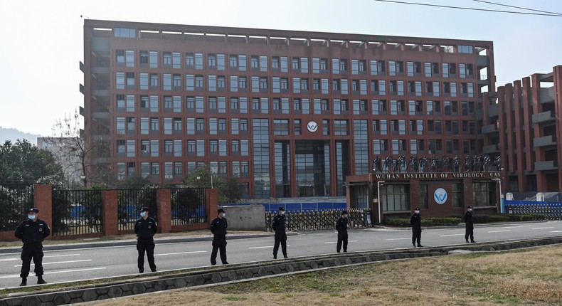 Guards stand outside the Wuhan Institute of Virology on February 3, 2021.
