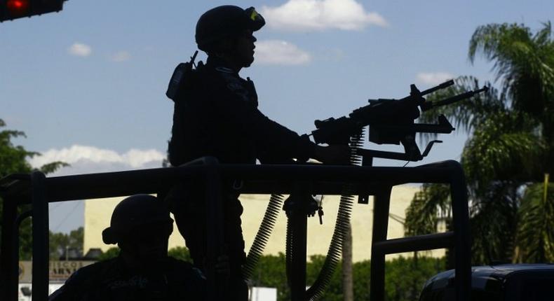 Mexican police patrol the streets of Guadalajara in 2015