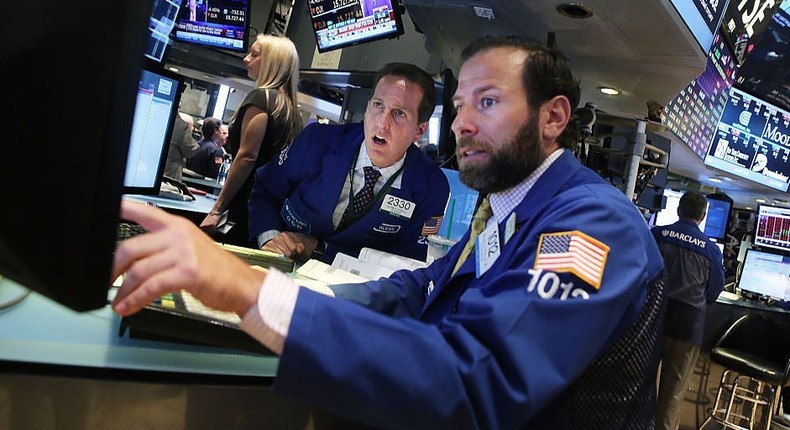 Traders work on the floor of the New York Stock Exchange (NYSE)Spencer Platt/Getty Images