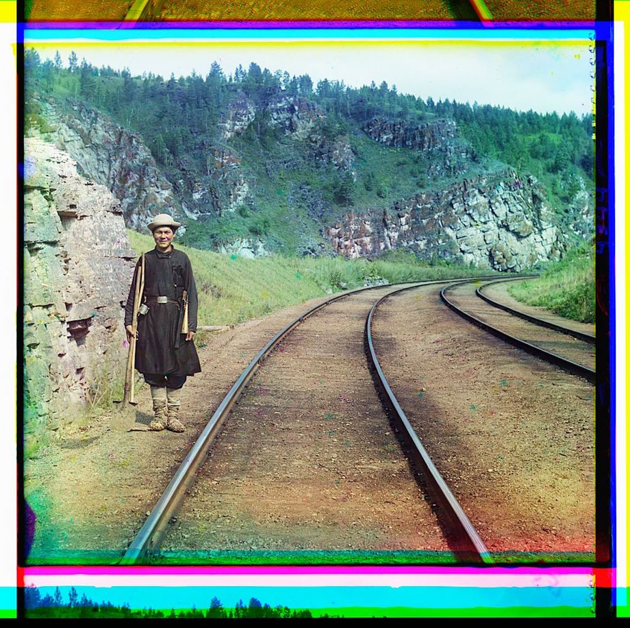 A switch operator poses on the Trans-Siberian Railroad, near the town of Ust Katav on the Yuryuzan River.