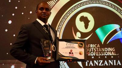 Makueni County Assembly Speaker Douglas Mbilu with his award in Tanzania