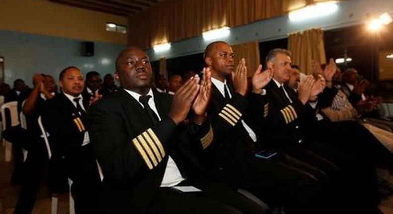 Kenya Airways captains attend a meeting on a pilots strike organised by Kenya Airline Pilots Association (KALPA) at the Jomo Kenyatta International Airport, Nairobi on April 28, 2016. 