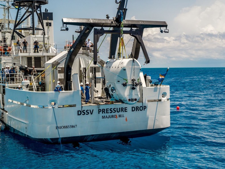 This refitted Navy ship will carry the $48 million sub around the world.