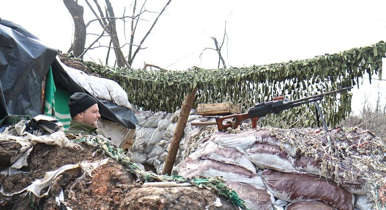 A Ukrainian soldier in trenches outside of Avdiivka near Russian-backed separatist positions in early April 2017.