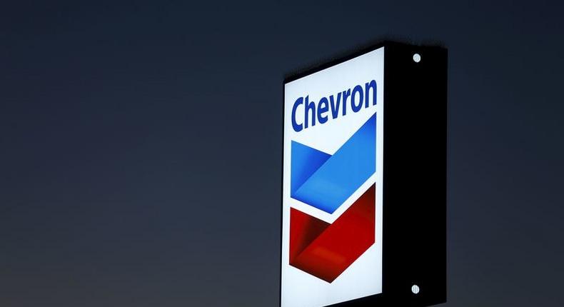 A Chevron gas station sign is shown in Cardiff, California, in this January 25, 2016 file photo. 