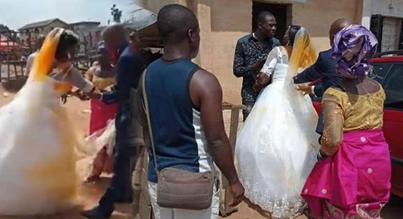 Woman storms wedding venue, pours red oil on husband’s bride