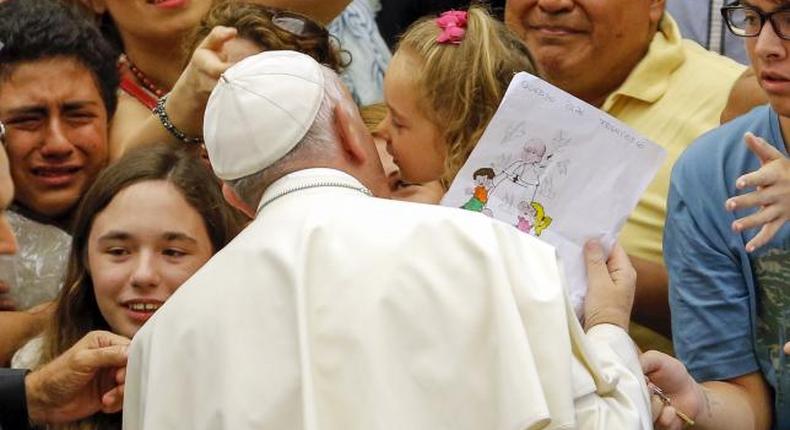 Don't treat divorced Catholics as outcasts, Pope tells priests