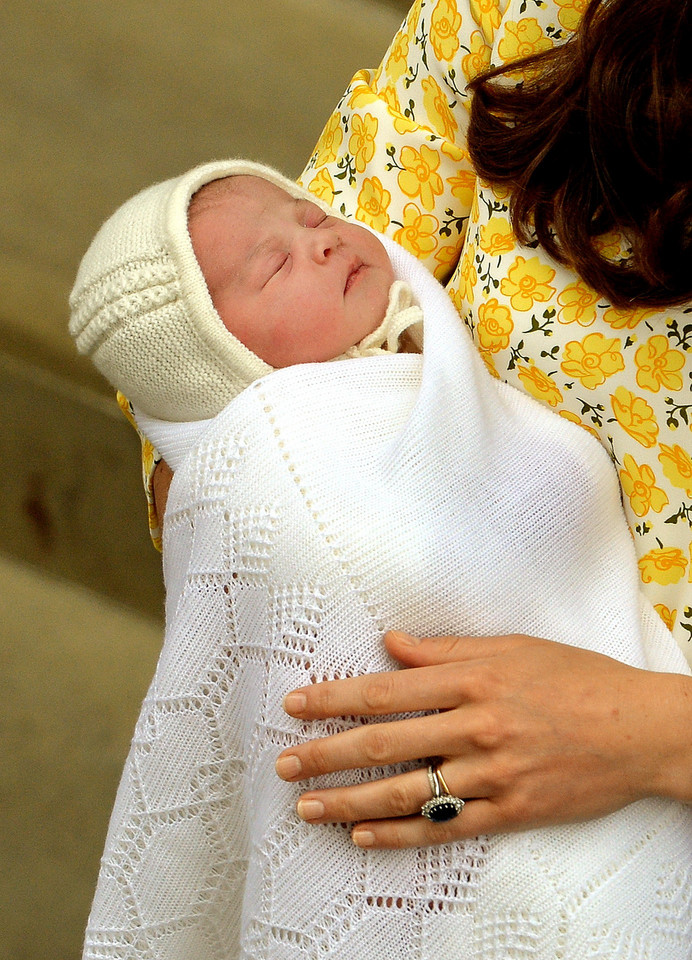 Księżna Kate i książę William ze swoją córeczką