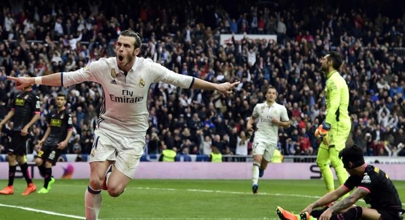 Real Madrid's Gareth Bale celebrates a goal during their Spanish league match against RCD Espanyol at the Santiago Bernabeu stadium in Madrid on February 18, 2017