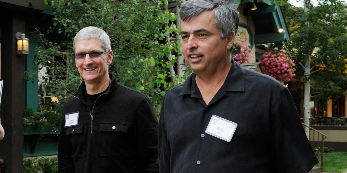 Apple CEO Tim Cook (left) with Eddy Cue (right)