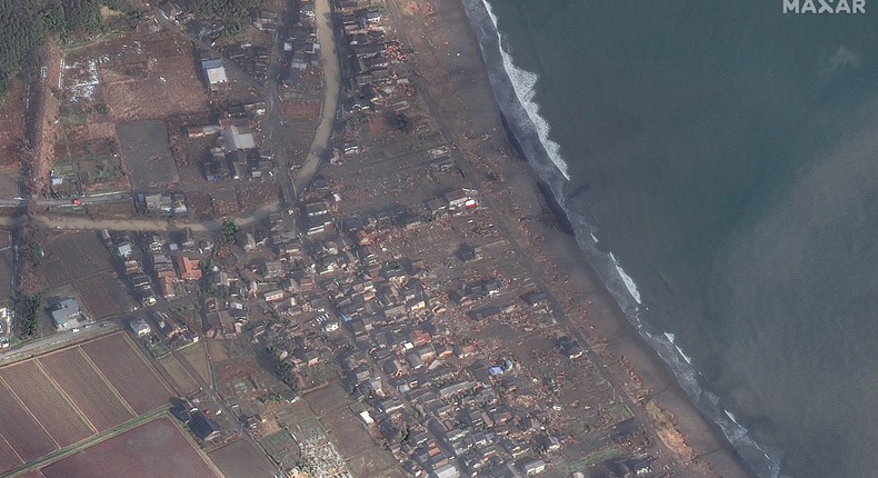 Destroyed, decimated buildings along the coastline near Ukai Japan.Satellite image 2024 Maxar Technologies