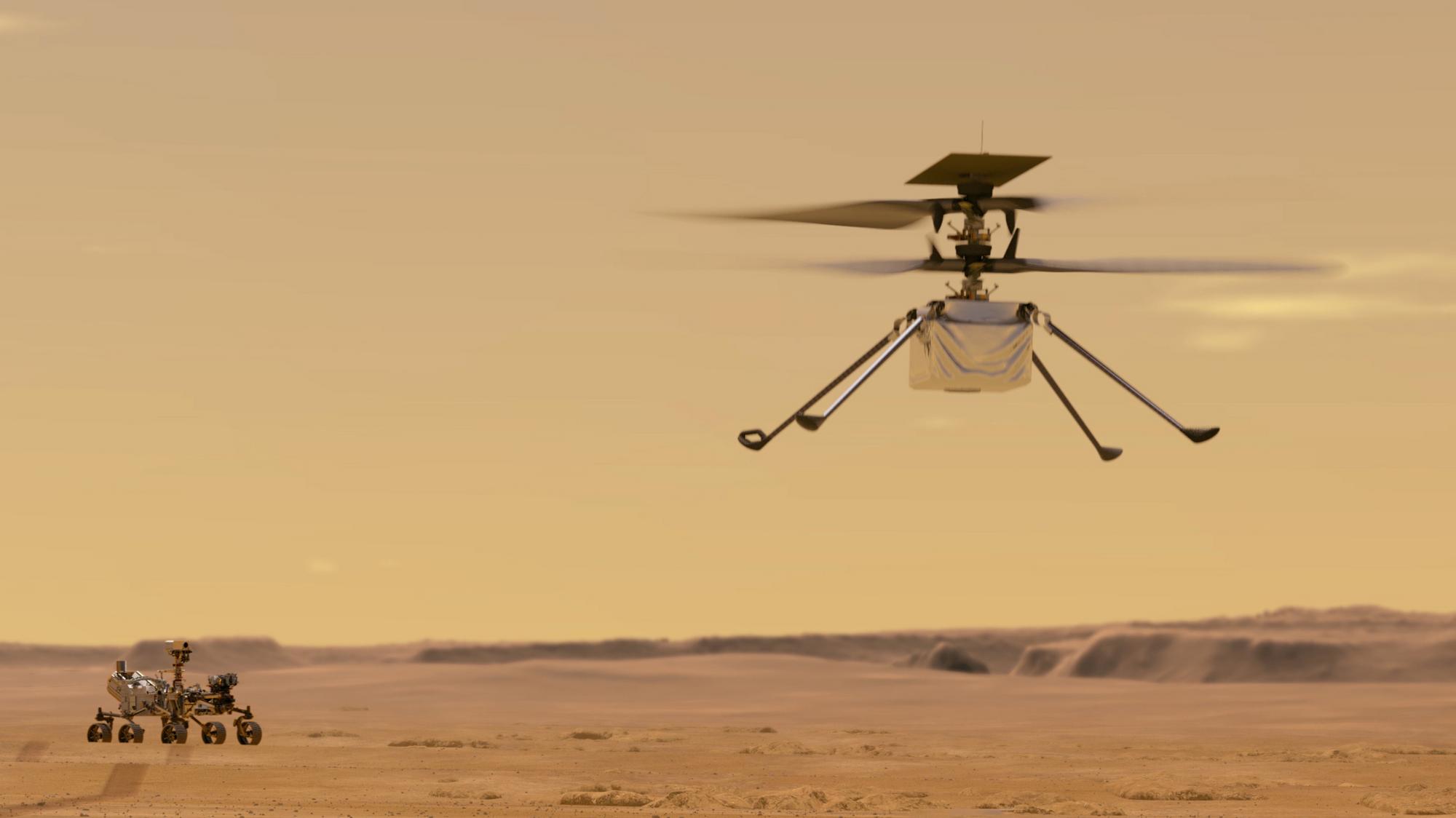 Vrtuľník Ingenuity na planéte Mars, v pozadí robotické vozidlo Perseverance
