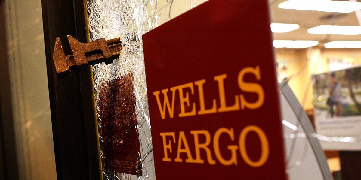 The window of a Wells Fargo bank after a protester smashed it with a pipe wrench during a demonstration in Oakland, California.