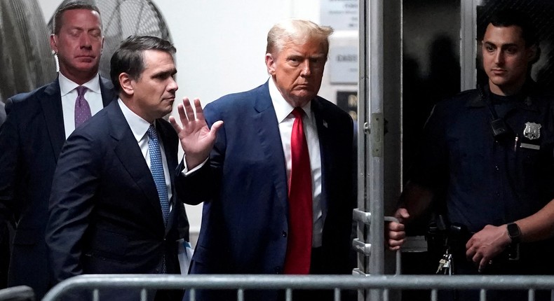 Donald Trump with attorney Todd Blanche, left, arriving at his hush-money trial in Manhattan.Reuters/Timothy A. Clary