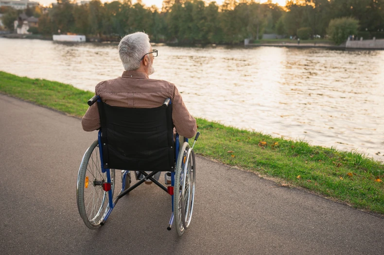 Muškarac u kolicima - ilustracija