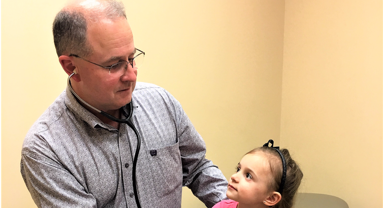 Dr. J. Bryan Hill with one of his patients.