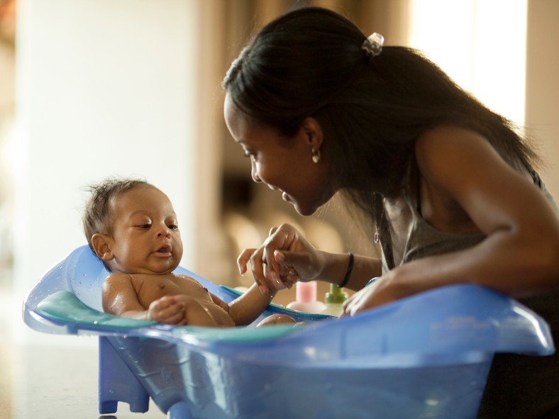 Bathing a newborn(The Fertile Chick)