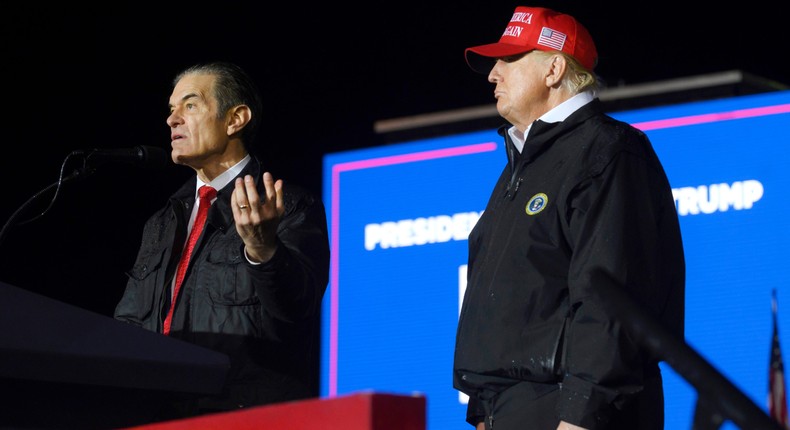 Pennsylvania Republican U.S. Senate candidate Dr. Mehmet Oz joins former President Donald Trump onstage during a rally in support of his campaign at the Westmoreland County Fairgrounds on May 6, 2022 in Greensburg, Pennsylvania.