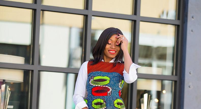 Stella Uzo chose a sleeveless print peplum over white shirt for a refreshing vibrant look