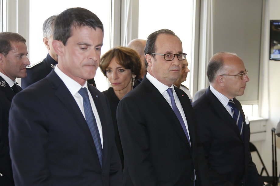 French President Francois Hollande, center, with Prime Minister Manuel Valls, left, and Interior Minister Bernard Cazeneuve before a meeting at the Prefecture the day after the Bastille Day truck attack.