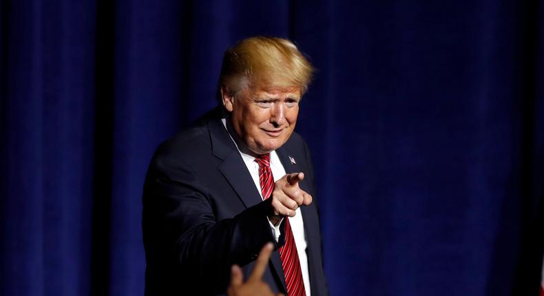 President Donald Trump acknowledges supporters after speaking at the Republican Party of Iowa's America First Dinner, Tuesday, June 11, 2019, in West Des Moines, Iowa. (AP Photo/Charlie Neibergall)