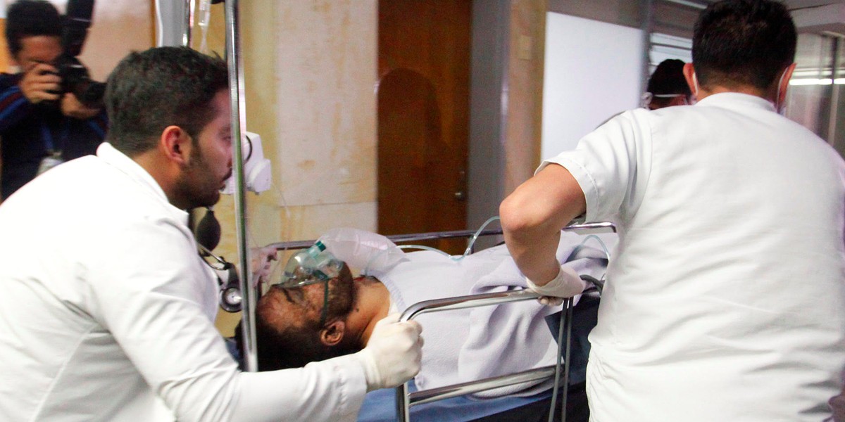 Ruschel receiving medical attention after the plane crash.