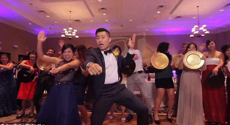 Robert Ly and Teresa Chan, from Orlando, surprised their 250 guests at the end of their wedding reception with a mission to record a seven-minute long music video