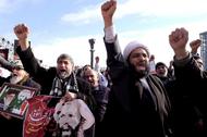 Iranian protesters chant slogans during a demonstration against the execution of Shi'ite cleric Shei