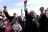 Iranian protesters chant slogans during a demonstration against the execution of Shi'ite cleric Shei